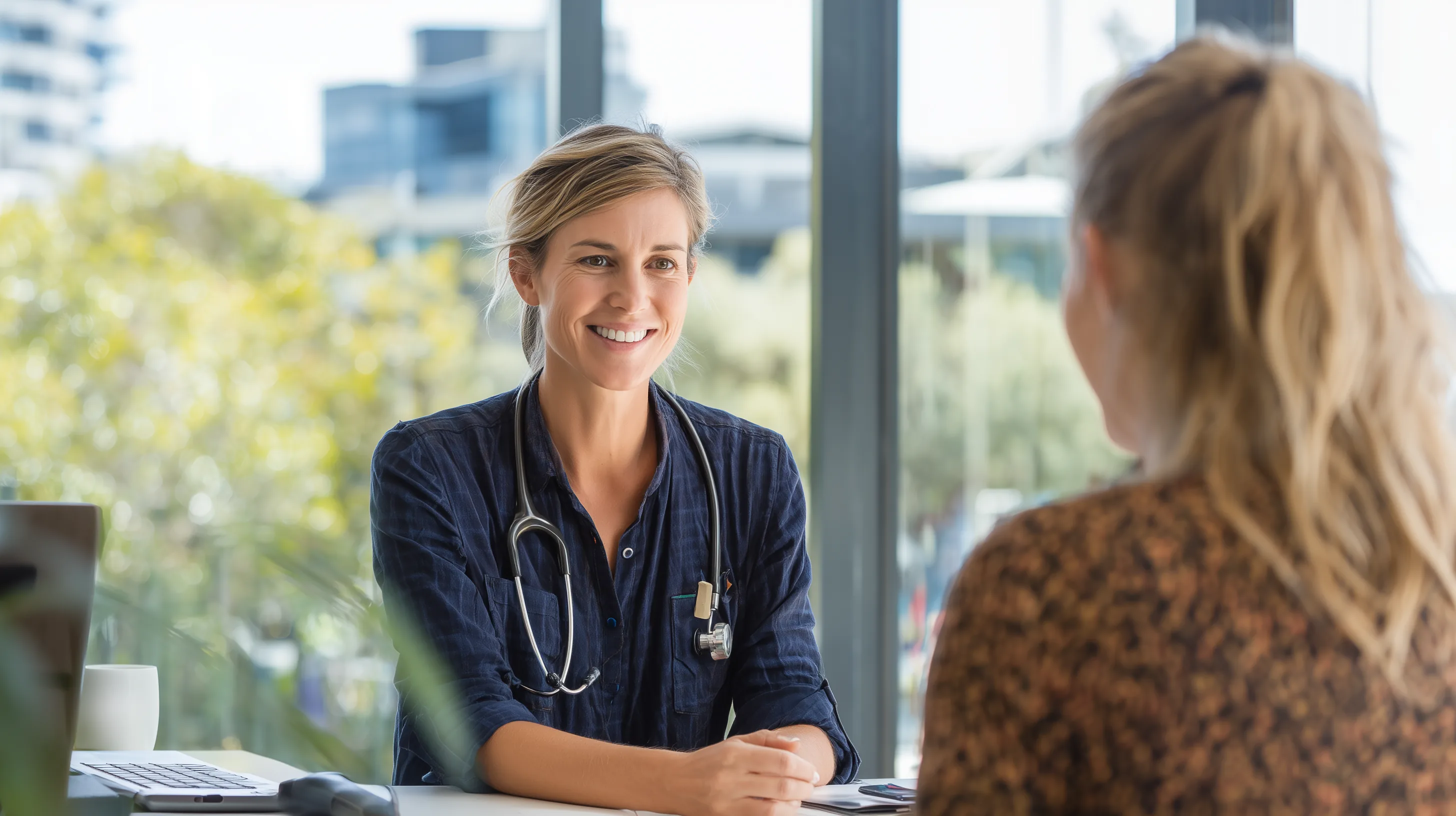 Australian medical specialist consulting with a patient